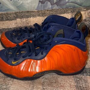 Nike Air Foamposite One sneakers in the "Blue Void/Rugged Orange"